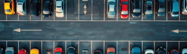 Interactive car park map showing numbered parking spaces, EV charging bays, entrances, exits and one-way routes for Microsoft Places car parking booking.